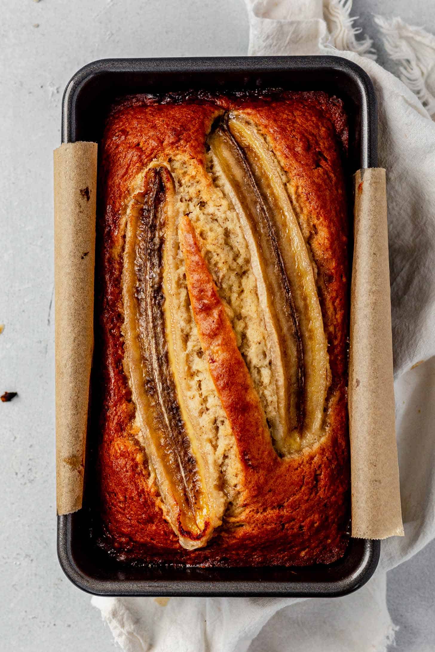 freshly baked brown butter banana bread in a loaf pan