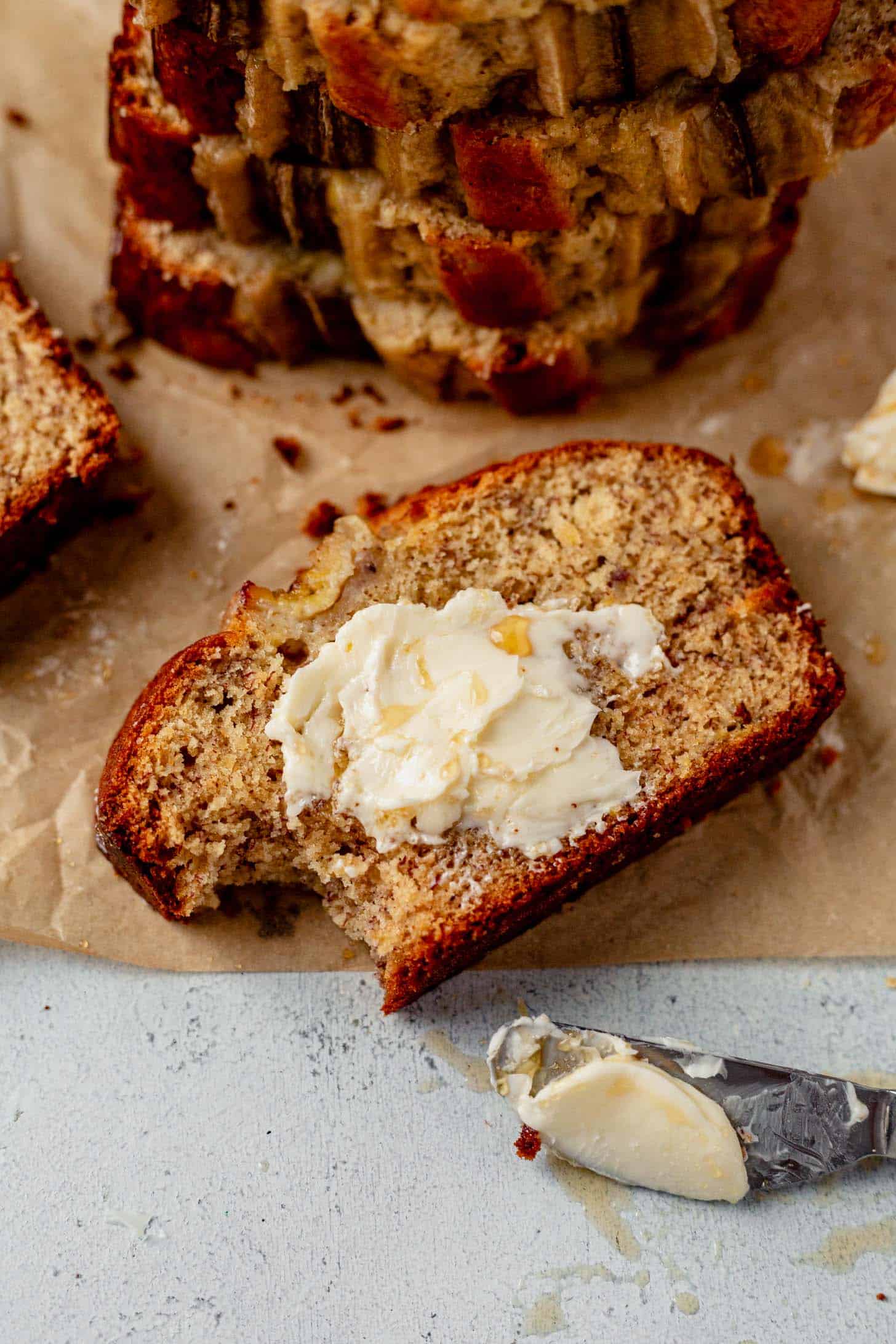 a piece of brown butter banana bread with butter 