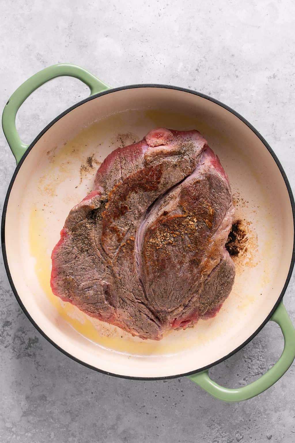 chuck roast seared in a pot