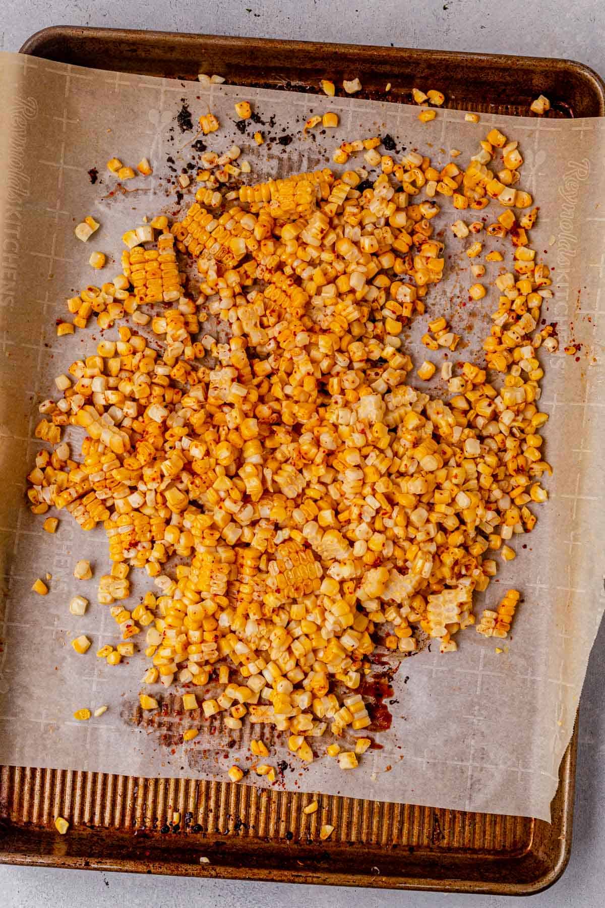 cooked corn cut off the cob in a baking pan