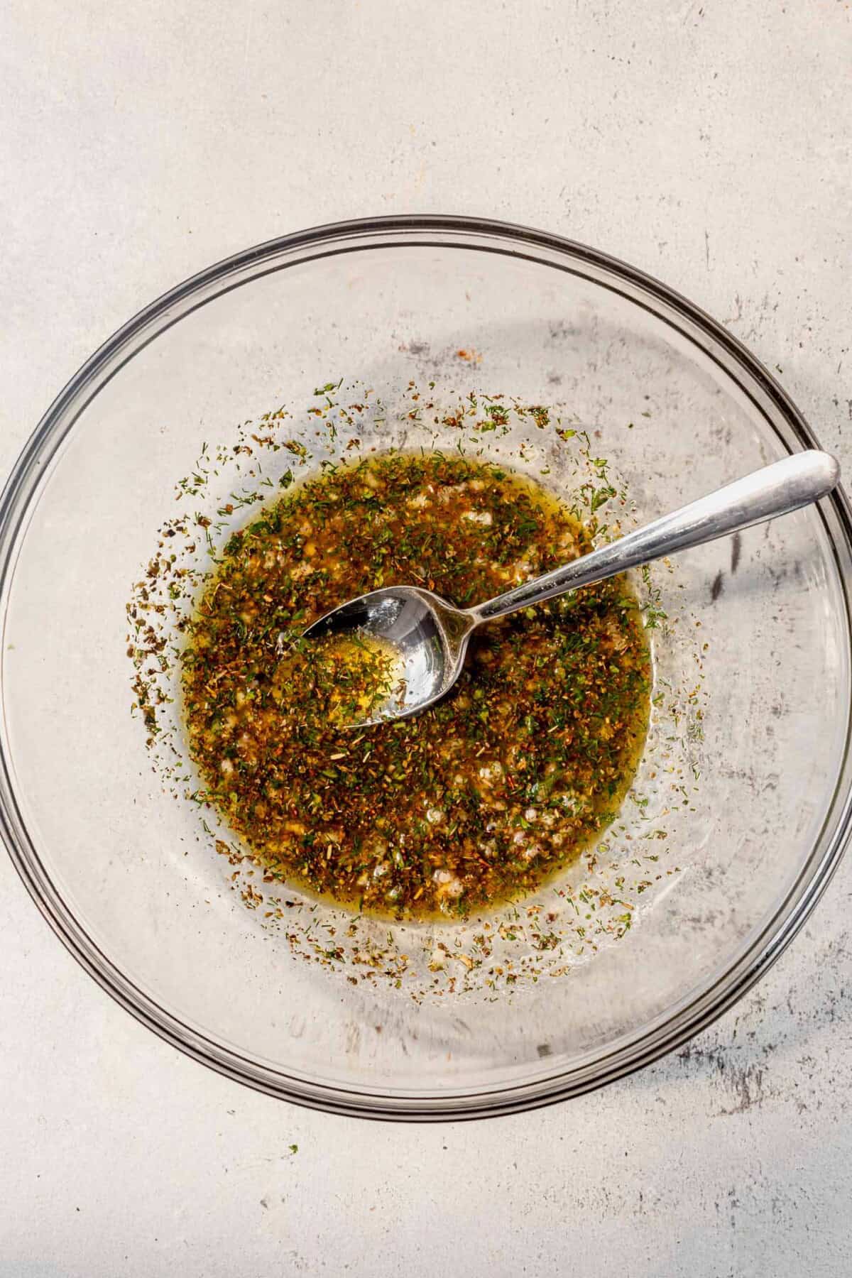 greek marinade in a mixing bowl