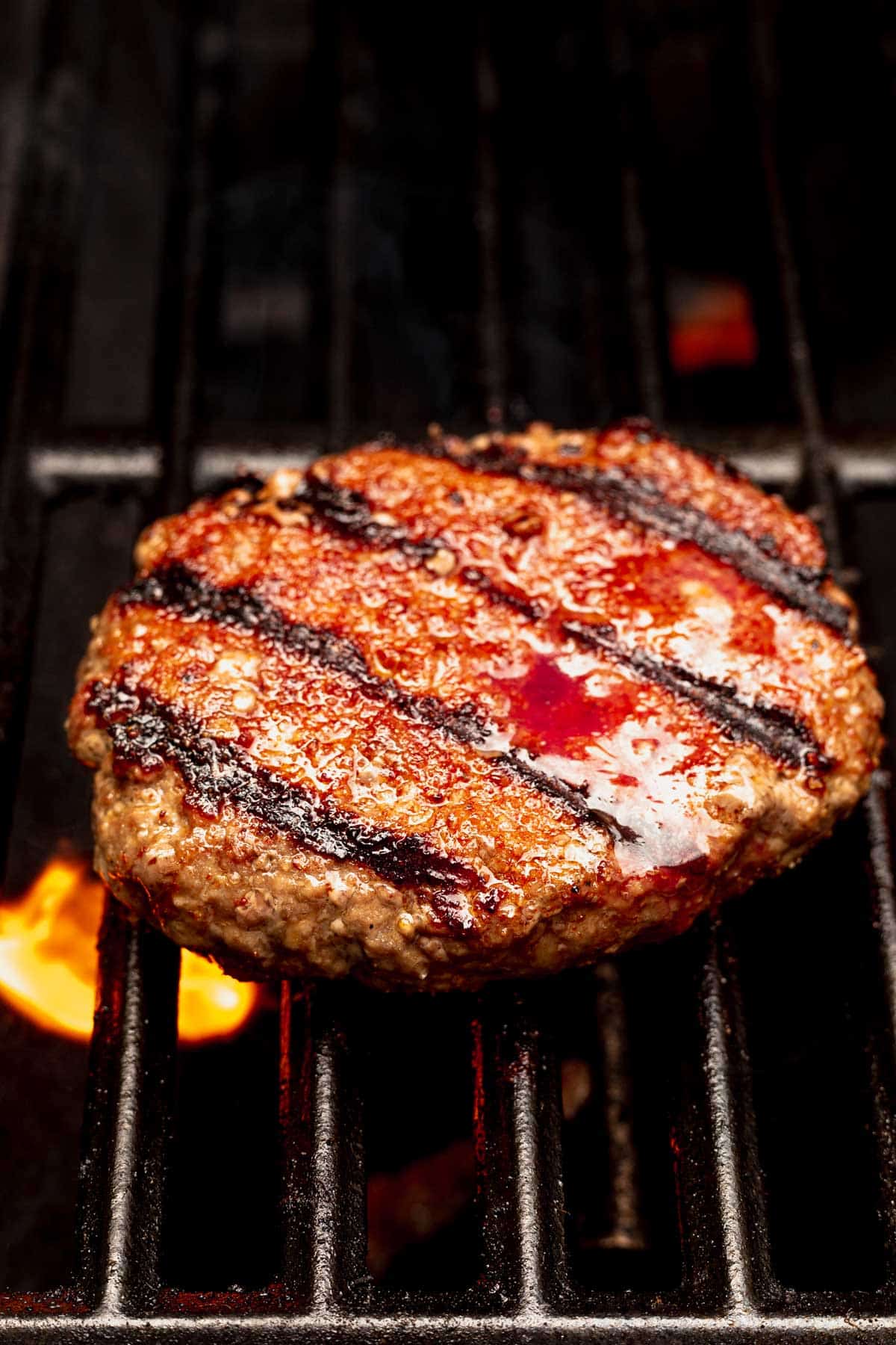 burger cooking on the grill