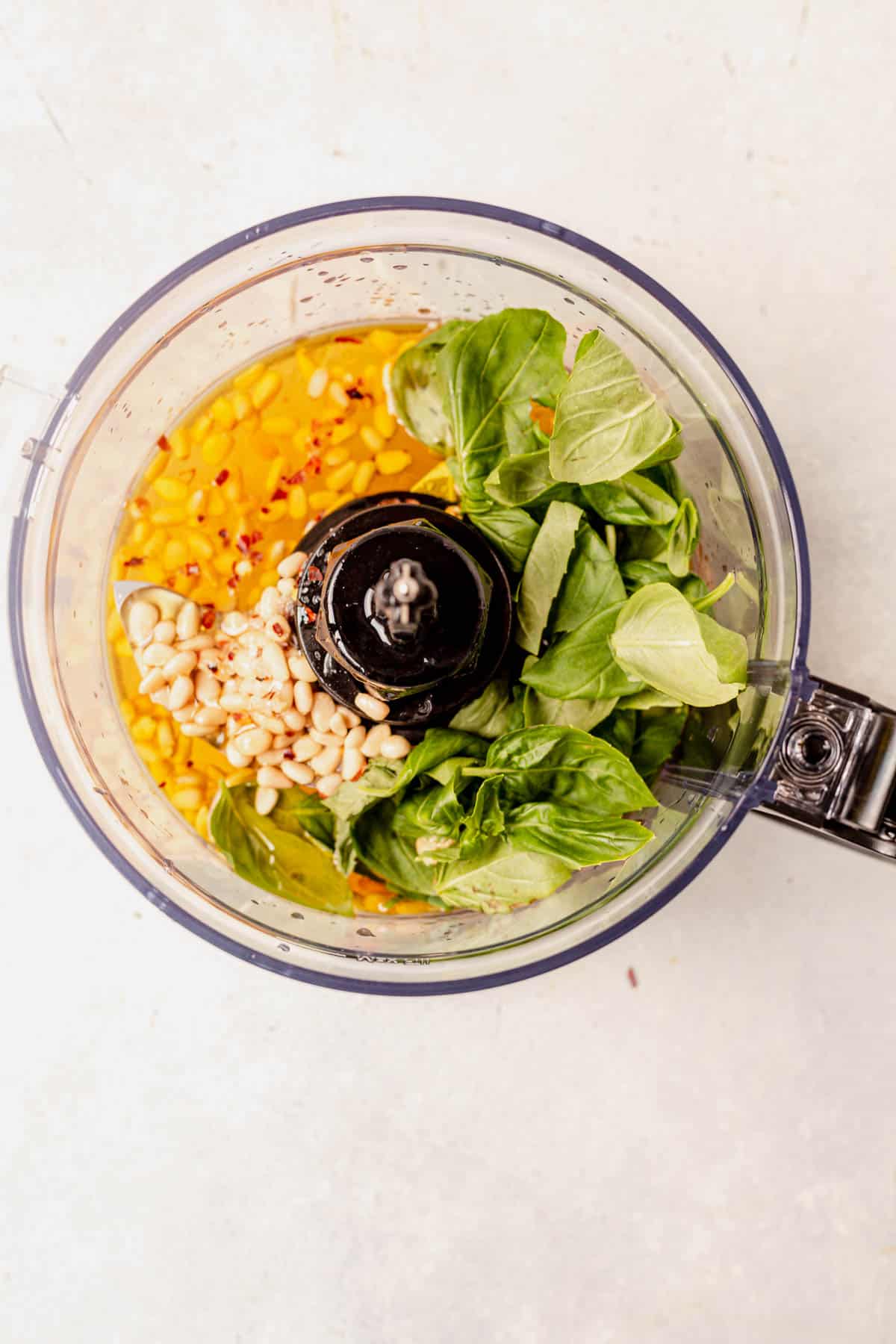 ingredients for lemon orzo pasta salad in a food processor