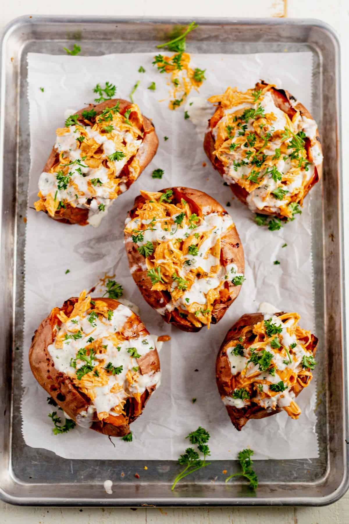 buffalo chicken dip inside a sweet potato