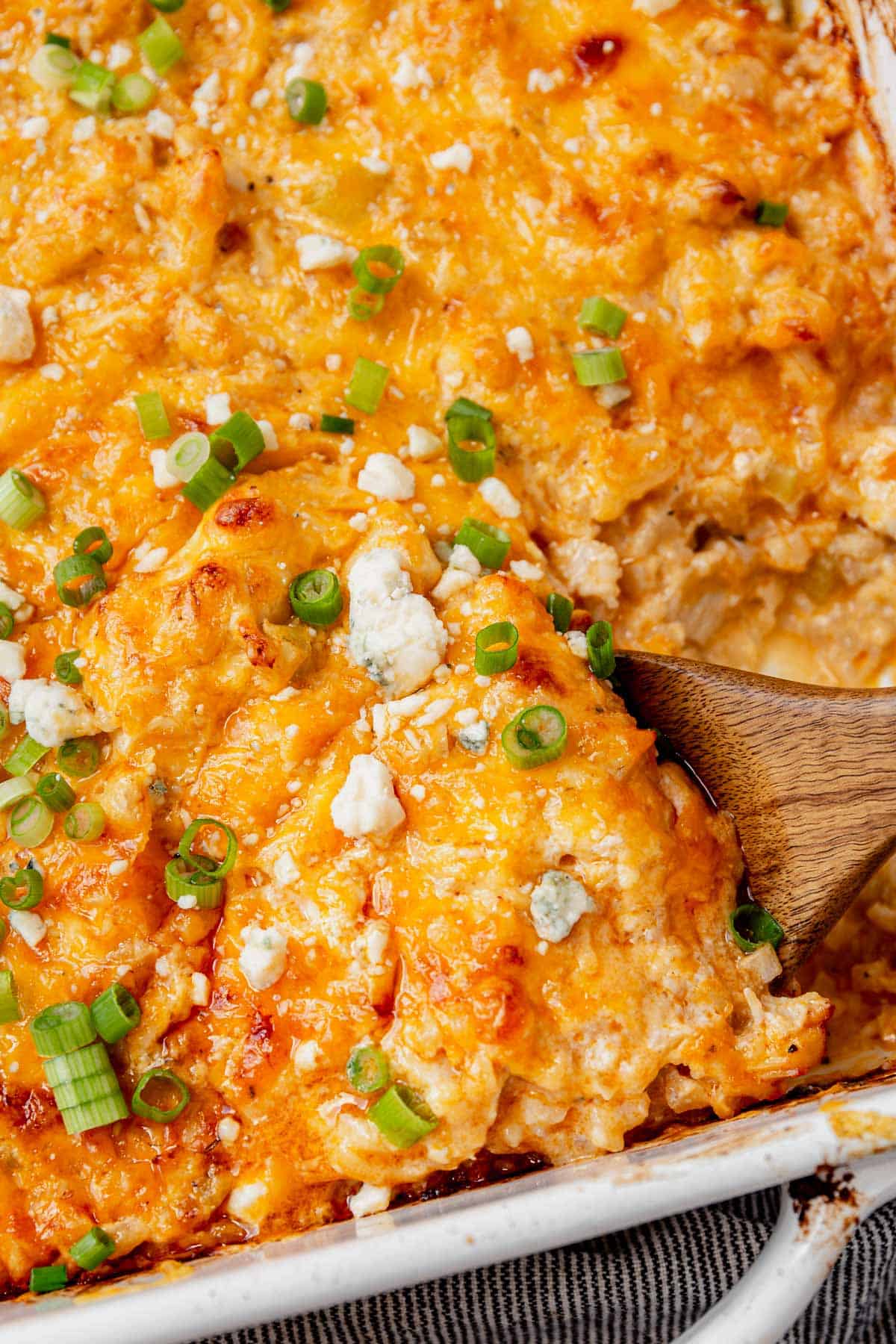 serving spoon in buffalo chicken casserole