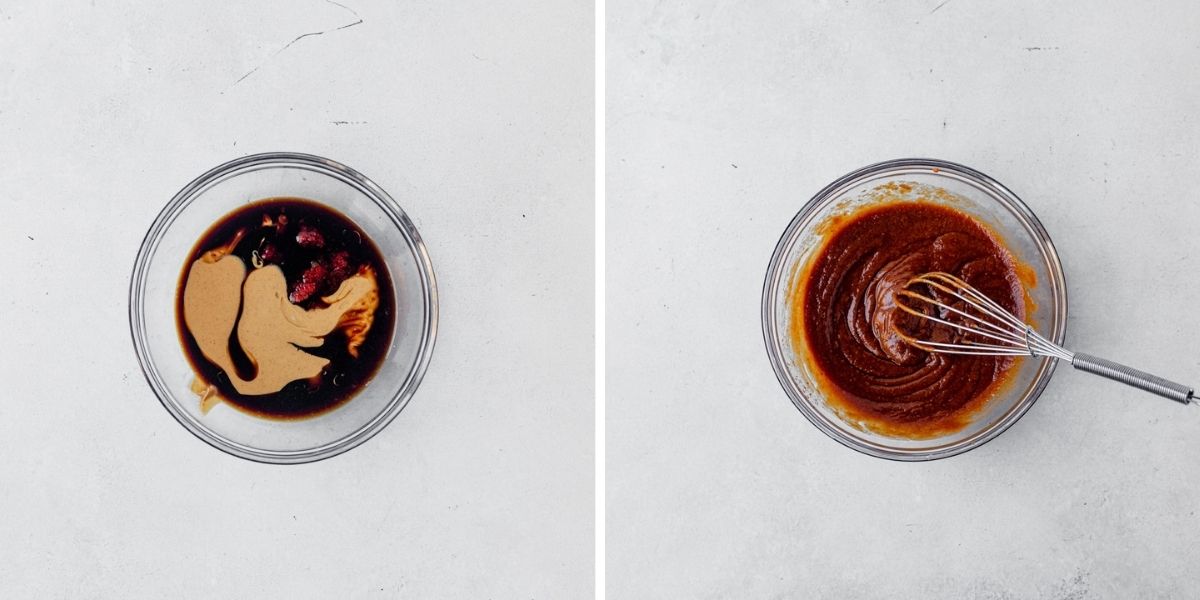 spicy thai peanut sauce in a glass bowl with a whisk