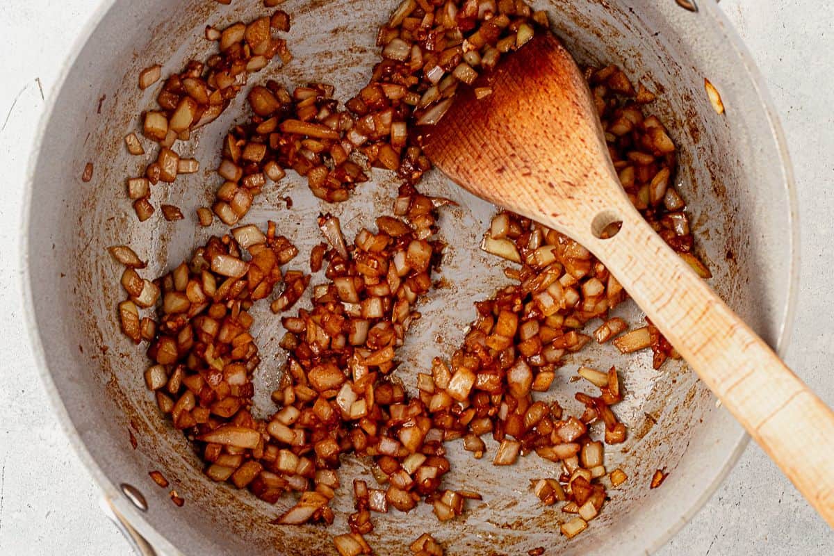 diced onion and garlic satueed in a pot