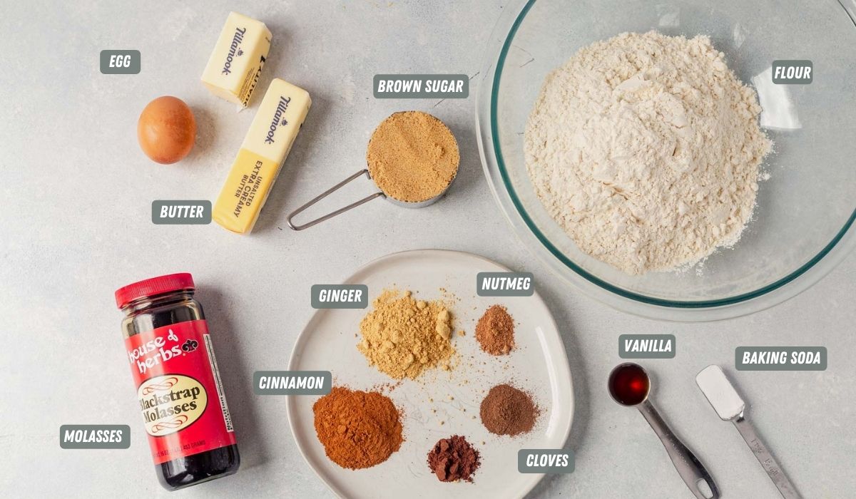 ingredients for gingerbread snowflake cookies on a table