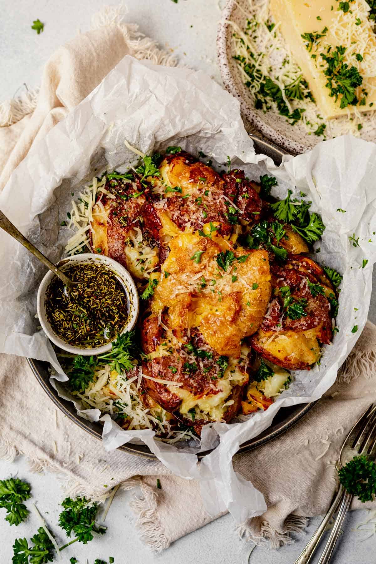 crispy air fryer breakfast potatoes in a dish with fresh parsley