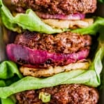 Hawaiian teriyaki burgers with grilled onion and pineapple slices