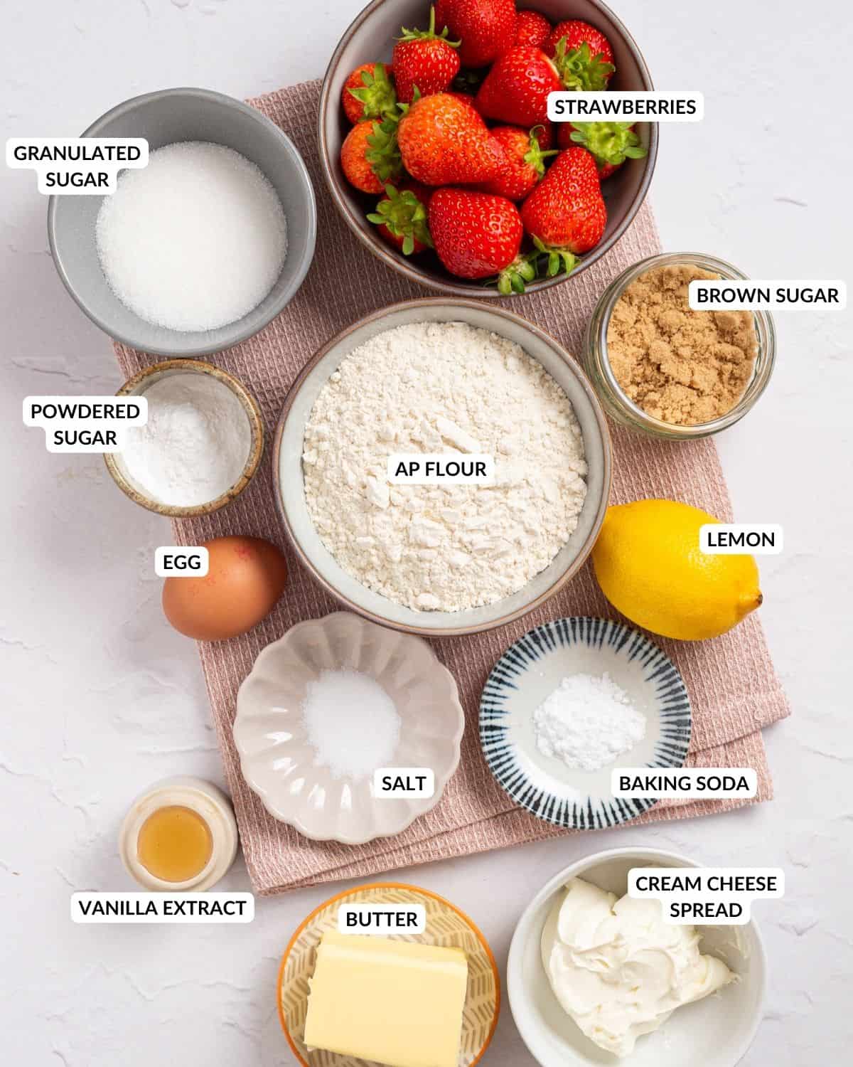 An image of the ingredients of strawberry cheesecake cookies with labels.