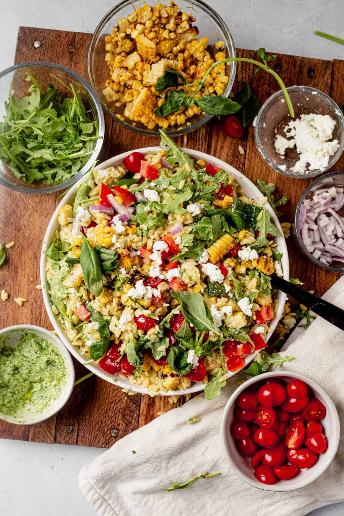 summer orzo pasta salad in a serving bowl