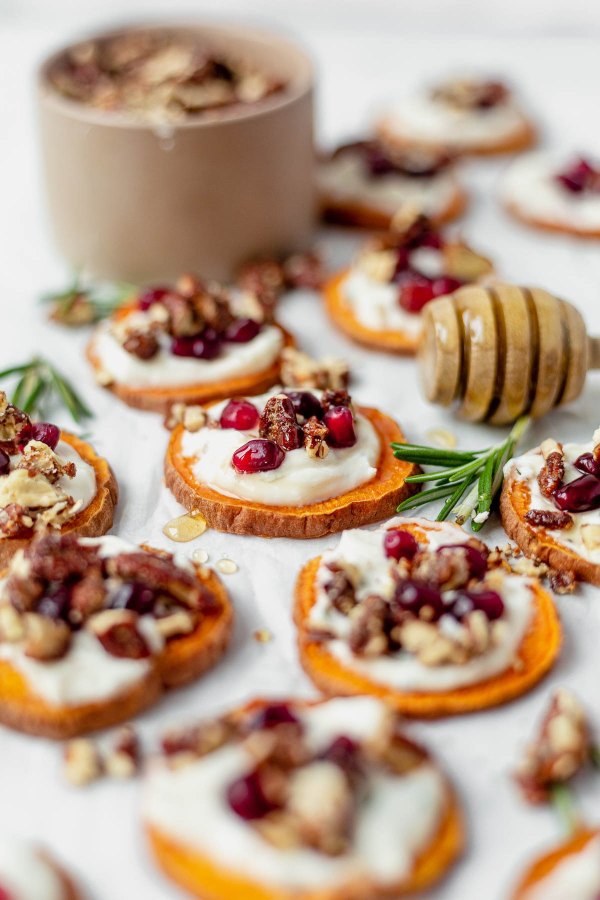 sweet potato bites topped with goat cheese, pecans and honey